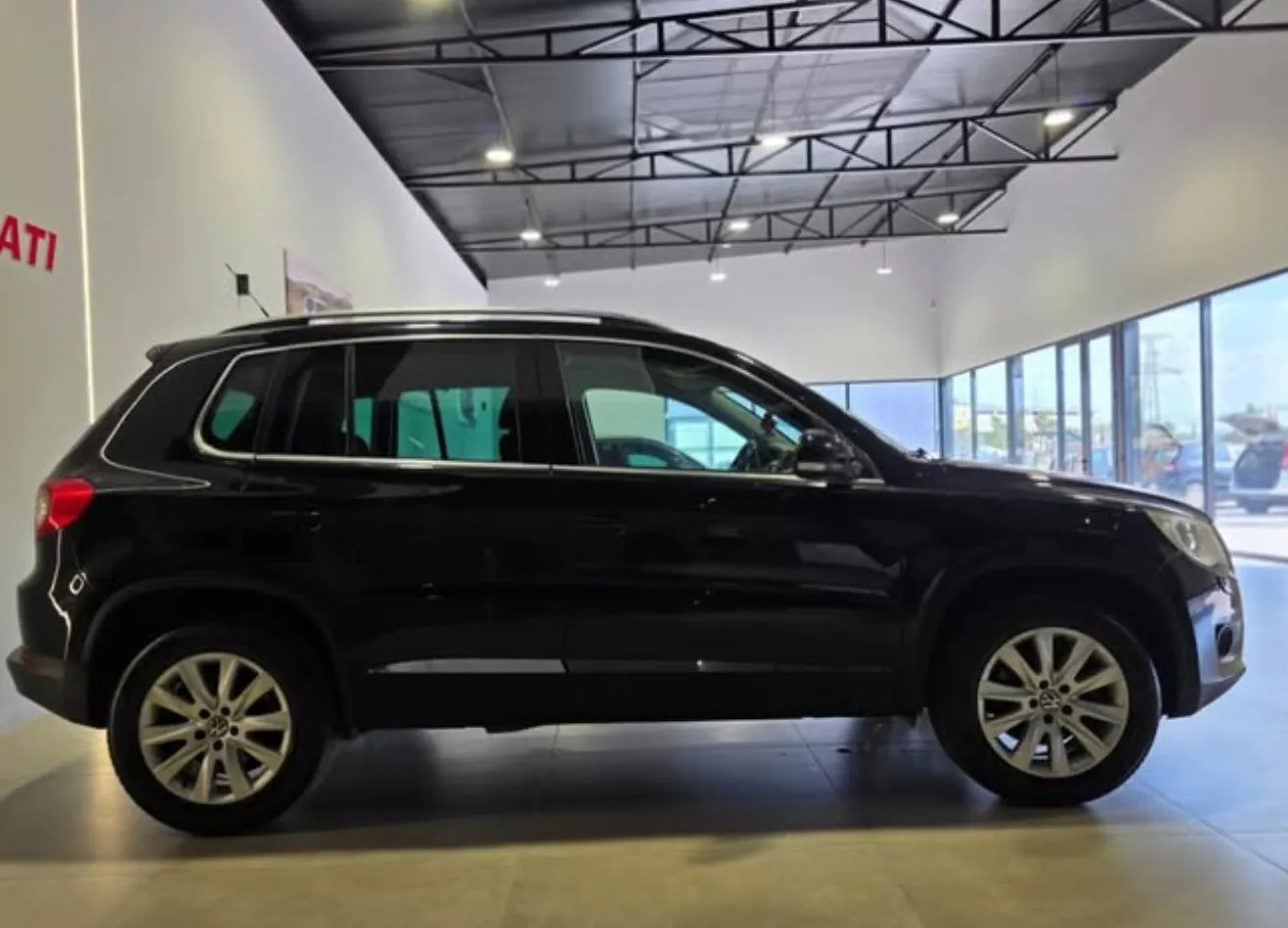 Volkswagen Tiguan, 2010 — 6